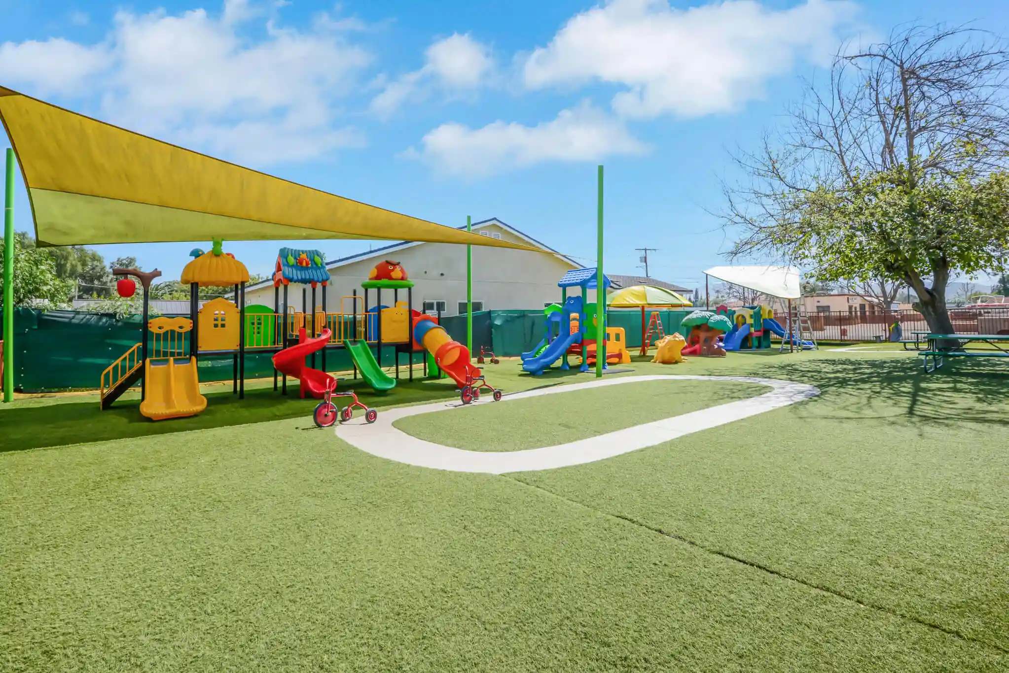 Bright, naturally lit, and spacious preschool classroom with open floor plan and quality learning materials at Sierra Preschool