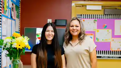 Qualified and caring preschool teachers providing individual attention to children in a supportive, child-centered learning environment at Sierra Preschool